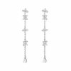 Pendientes Largos Flor Oro para fiesta evento. Sofisticados. De oro con diamantes circonitas en forma de pétalos de flor.